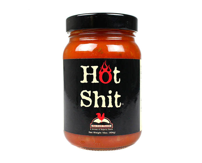 Jar of hot sauce with a black label on a white background