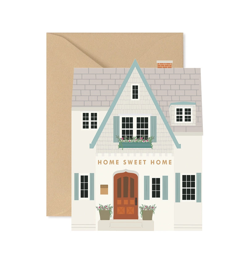 Greeting card with a house illustration and 'Home Sweet Home' text, featuring a brown envelope.