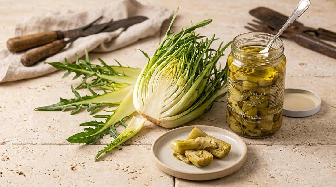 Fresh puntarelle chicory shoots beside an open jar of preserved I Contadini puntarelle