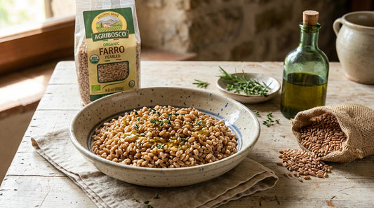 Cooked Italian farro with dry farro grains, herbs and an Agribosco farro package