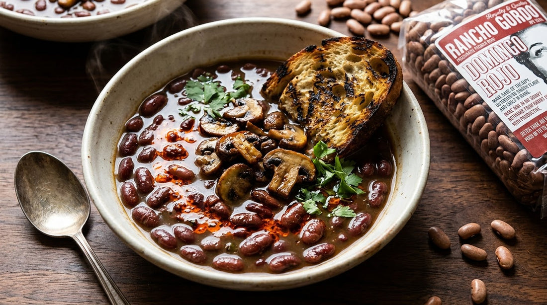 Brothy heirloom beans with roasted mushrooms, chile oil and herbs