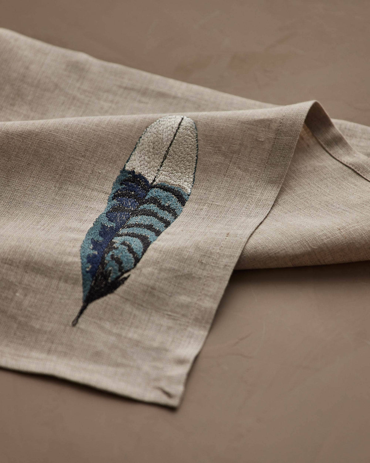 Coral & Tusk - Blue Jay Feather - Dinner Napkin