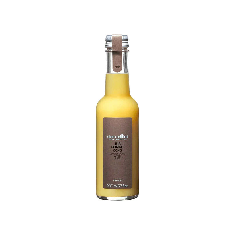 Yellow bottle with a brown label on a white background