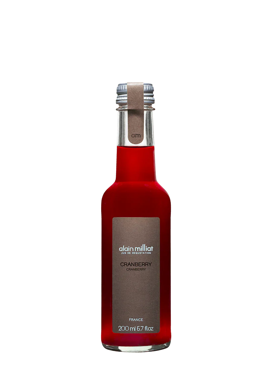Red bottle with silver cap on a white background