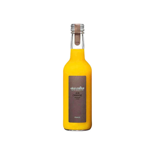 Yellow bottle of Alain Milliat orange juice on a white background