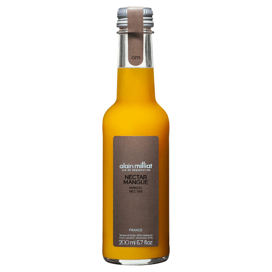 Bottle of Alain Milliat Mango Nectar on a white background