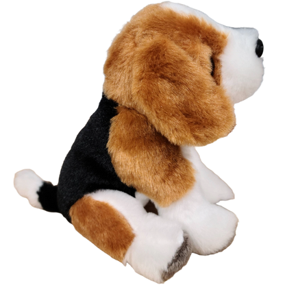 Plush toy dog with brown, black, and white fur on a white background