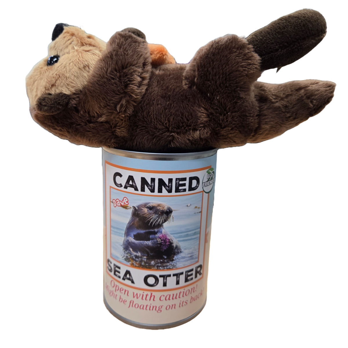 Plush sea otter toy inside a can labeled 'Canned Sea Otter' on a white background