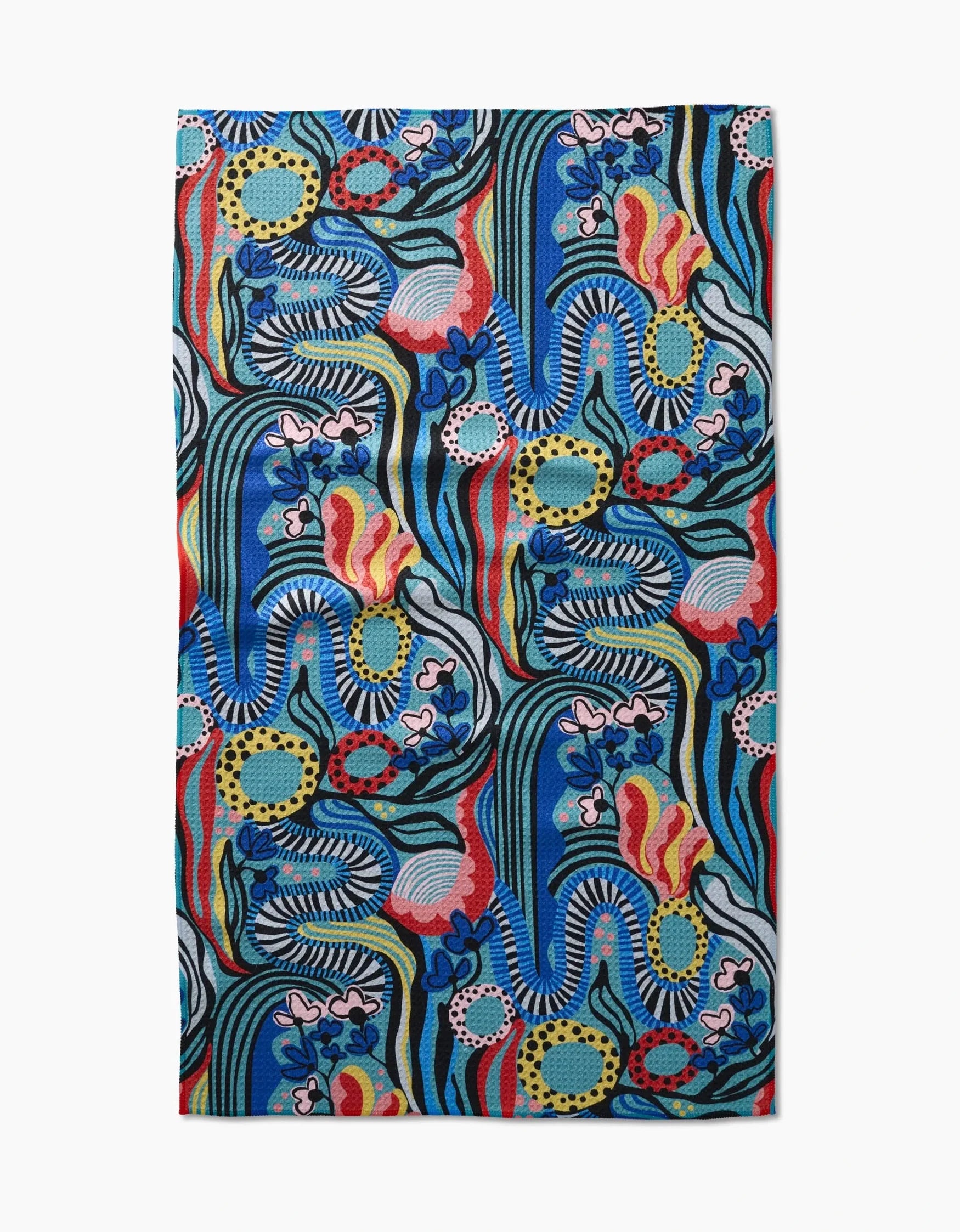 Colorful abstract patterned towel on a white background