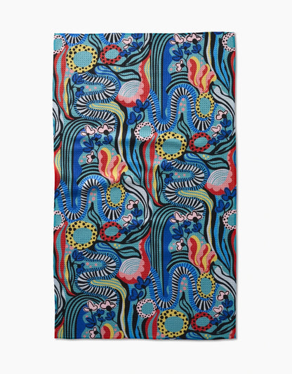 Colorful abstract patterned towel on a white background