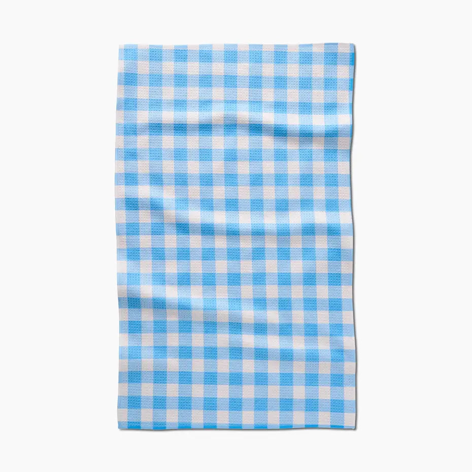 Blue and white checkered towel on a white background