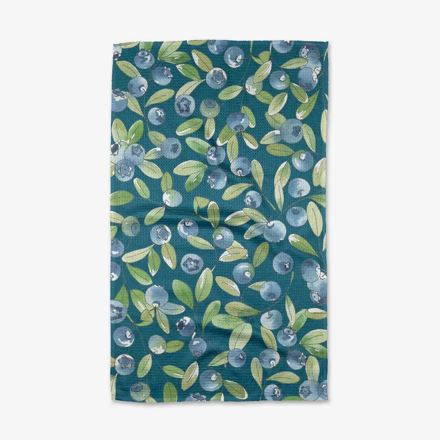 Tea towel with blueberry pattern on a teal background