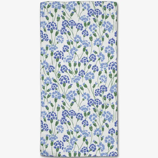Floral patterned towel with blue flowers on a white background