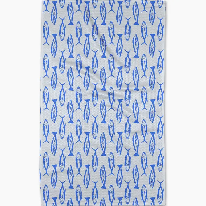 Towel with blue fish pattern on a white background