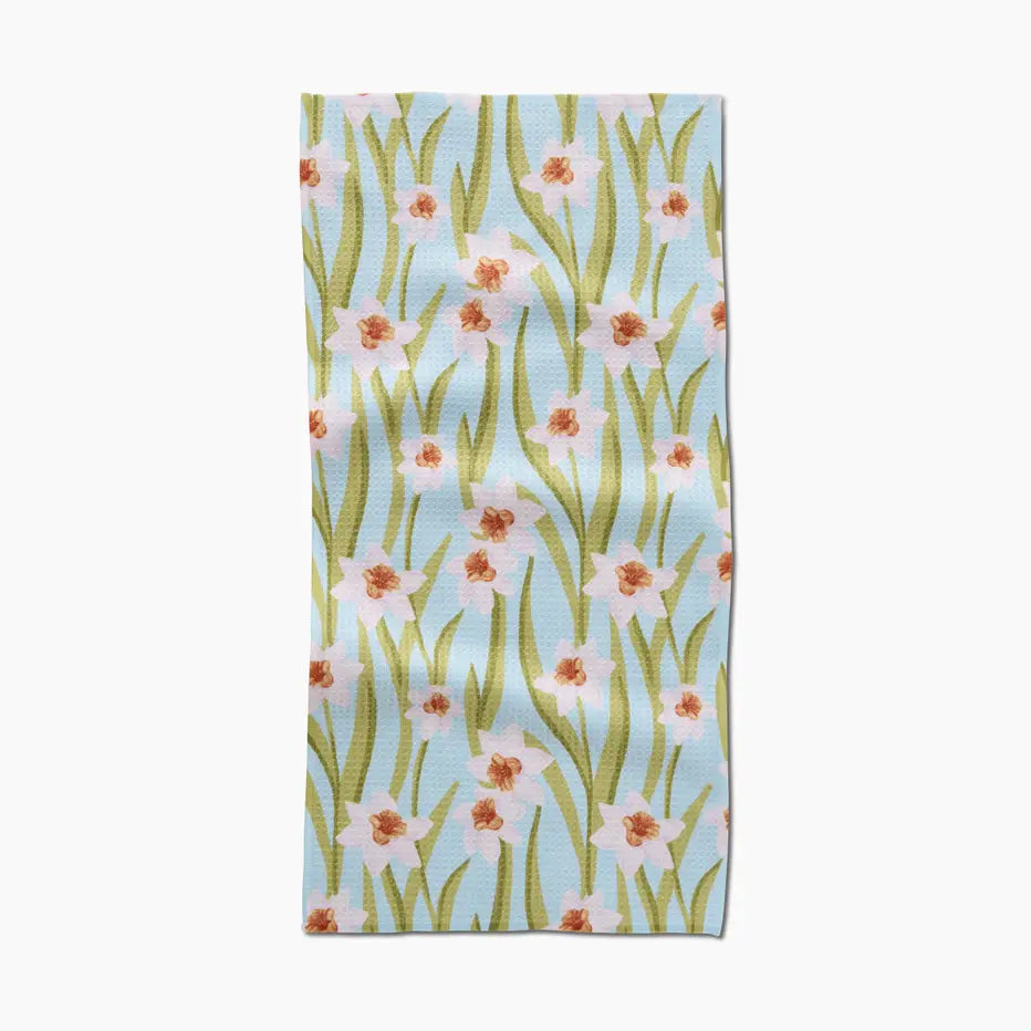 Towel with floral pattern on a light blue background