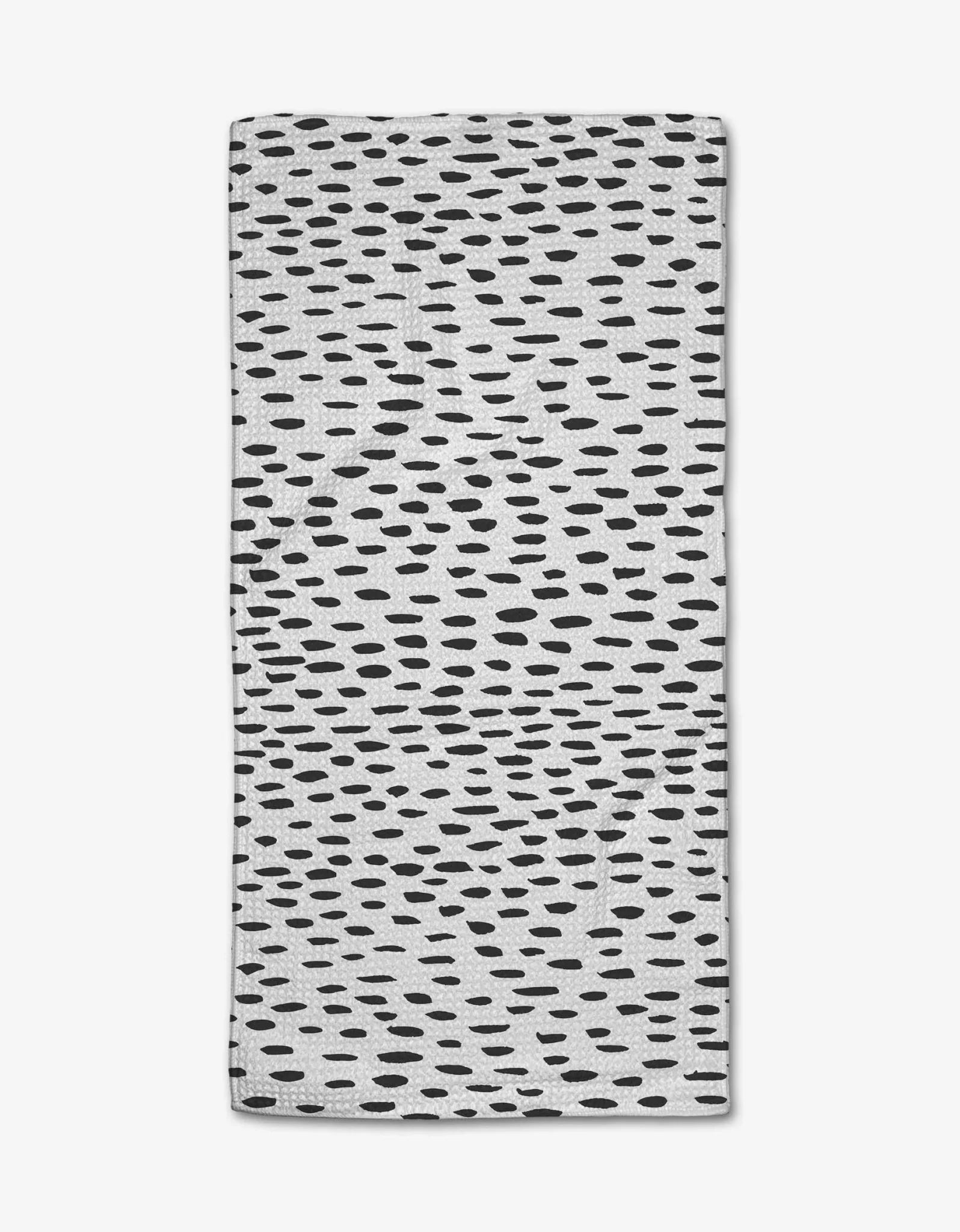 Textile with black abstract pattern on a white background