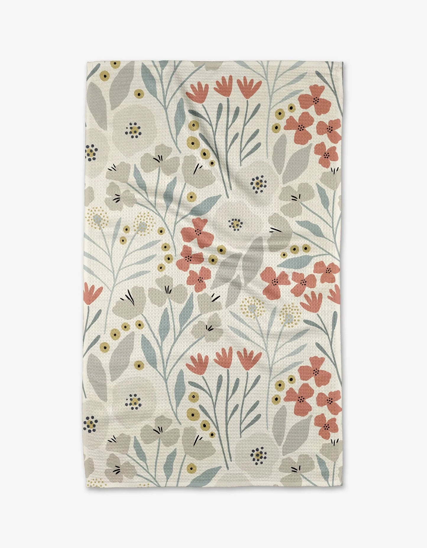 Floral patterned towel with pink, red, and green flowers on a beige background