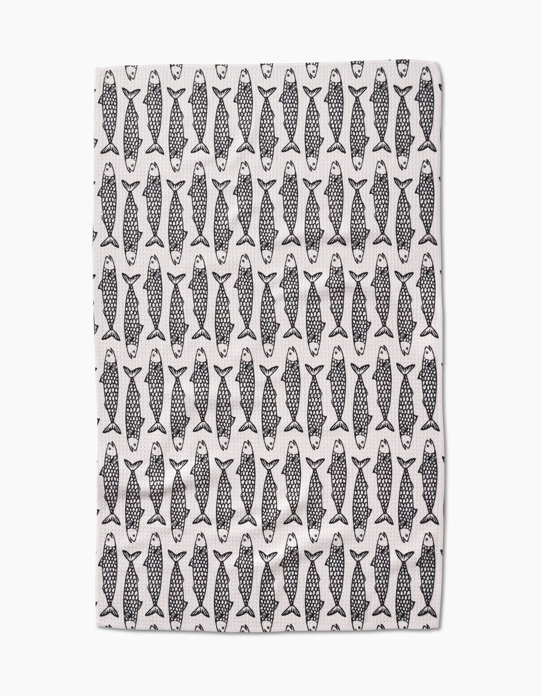 Tea towel with fish pattern on a white background