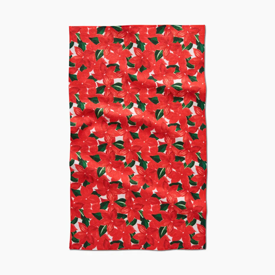 Red floral patterned towel on a white background