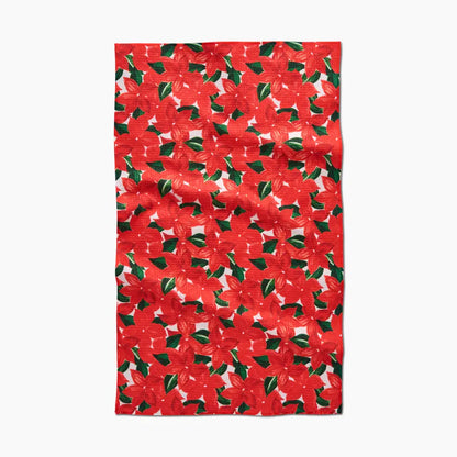 Red floral patterned towel on a white background