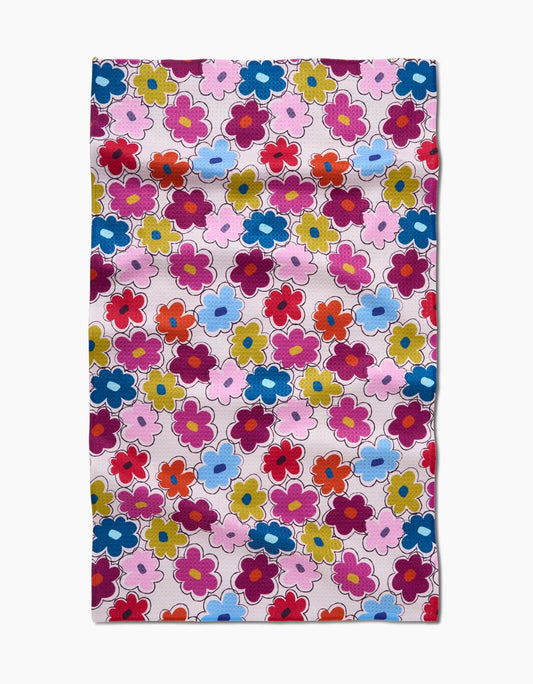 Floral patterned fabric with colorful flowers on a white background