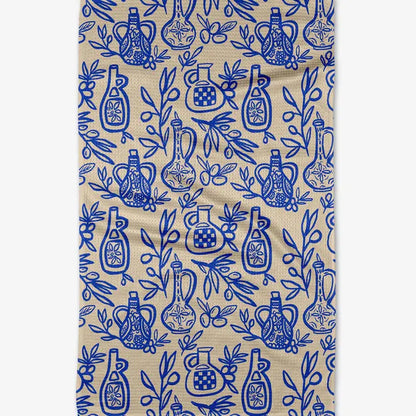 Patterned fabric with blue bottles and leaves on a beige background