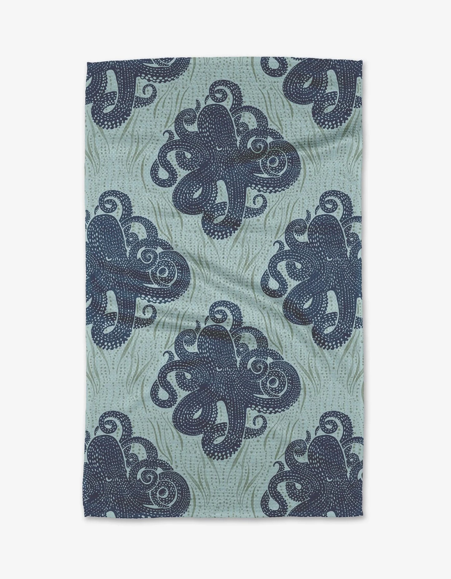 Tea towel with blue octopus pattern on a light green background