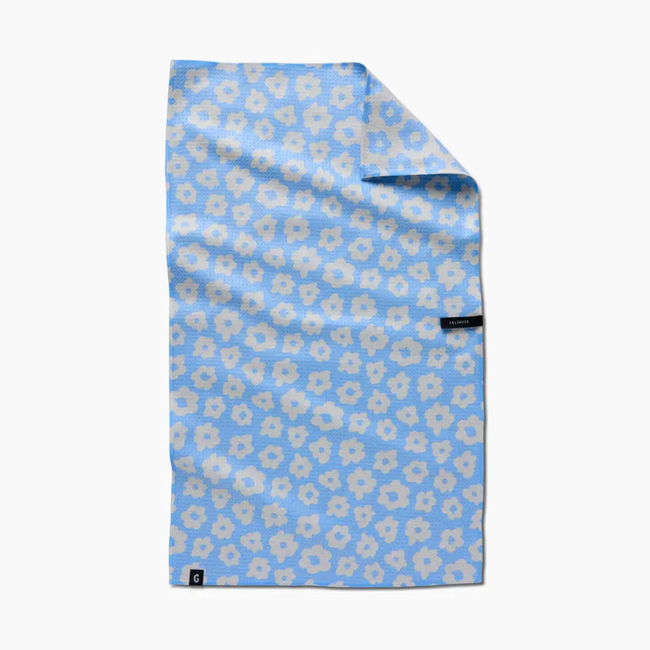 Floral patterned towel on a white background