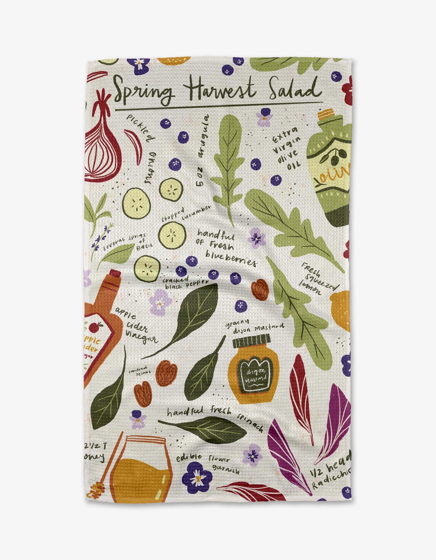 Patterned product packaging with illustrations of vegetables and text on a white background