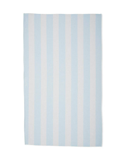 Striped rug with light blue and white stripes on a white background