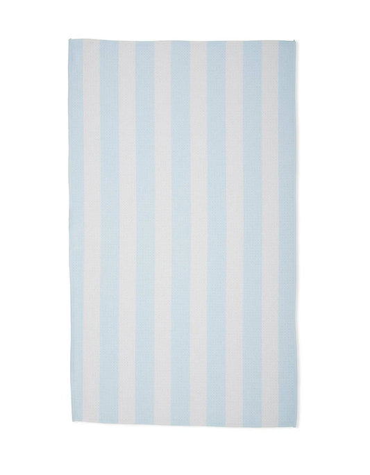 Striped rug with light blue and white stripes on a white background