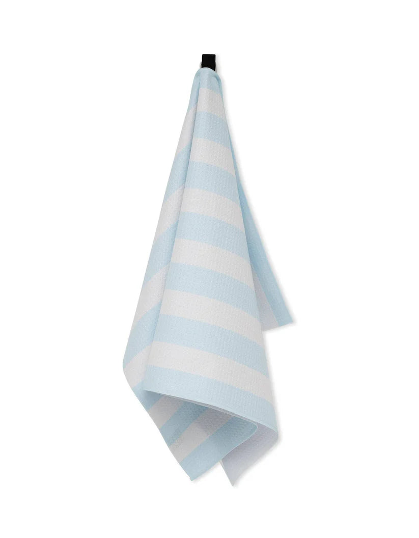 Folded blue and white striped towel on a white background