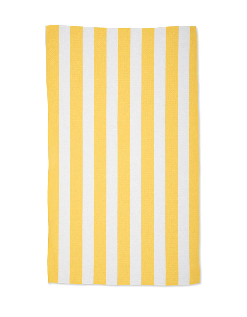 Yellow and white striped towel on a white background