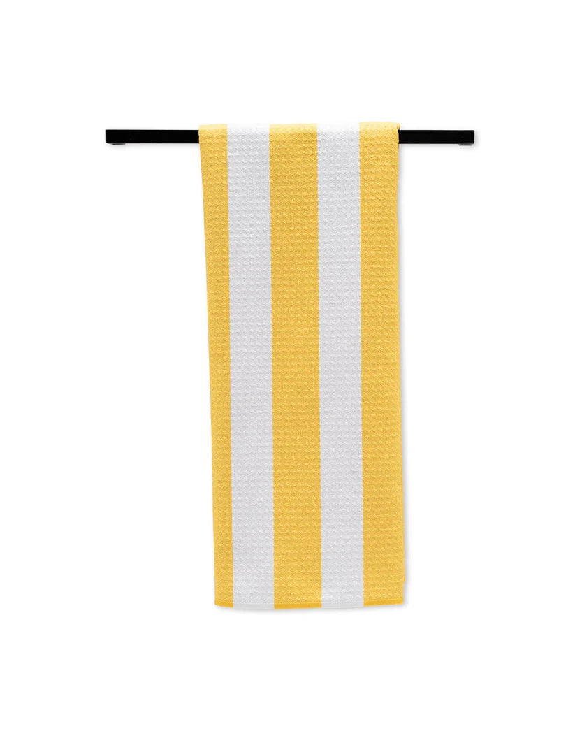 Yellow and white striped towel on a black rod against a white background