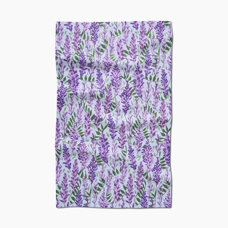 Floral patterned fabric with purple flowers on a white background