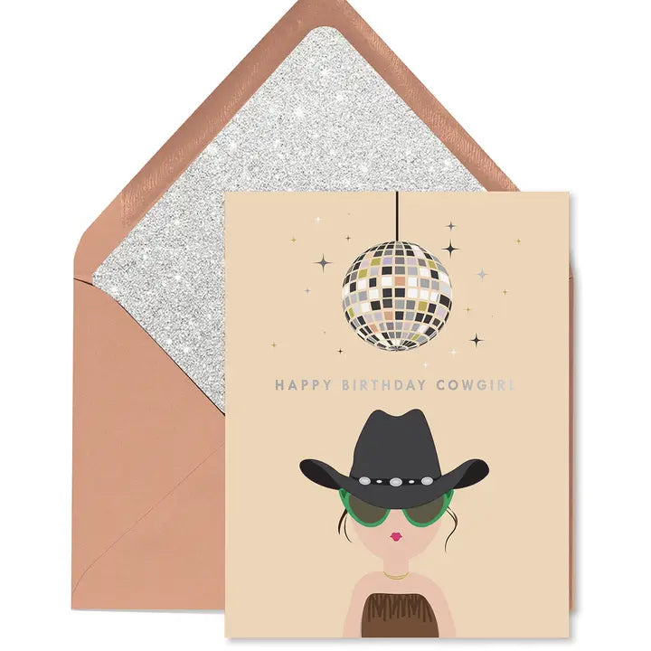Greeting card with a cowgirl design and disco ball, featuring an envelope with a glittery interior.