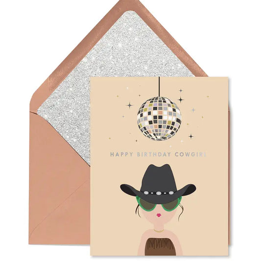 Greeting card with a cowgirl design and disco ball, featuring an envelope with a glittery interior.