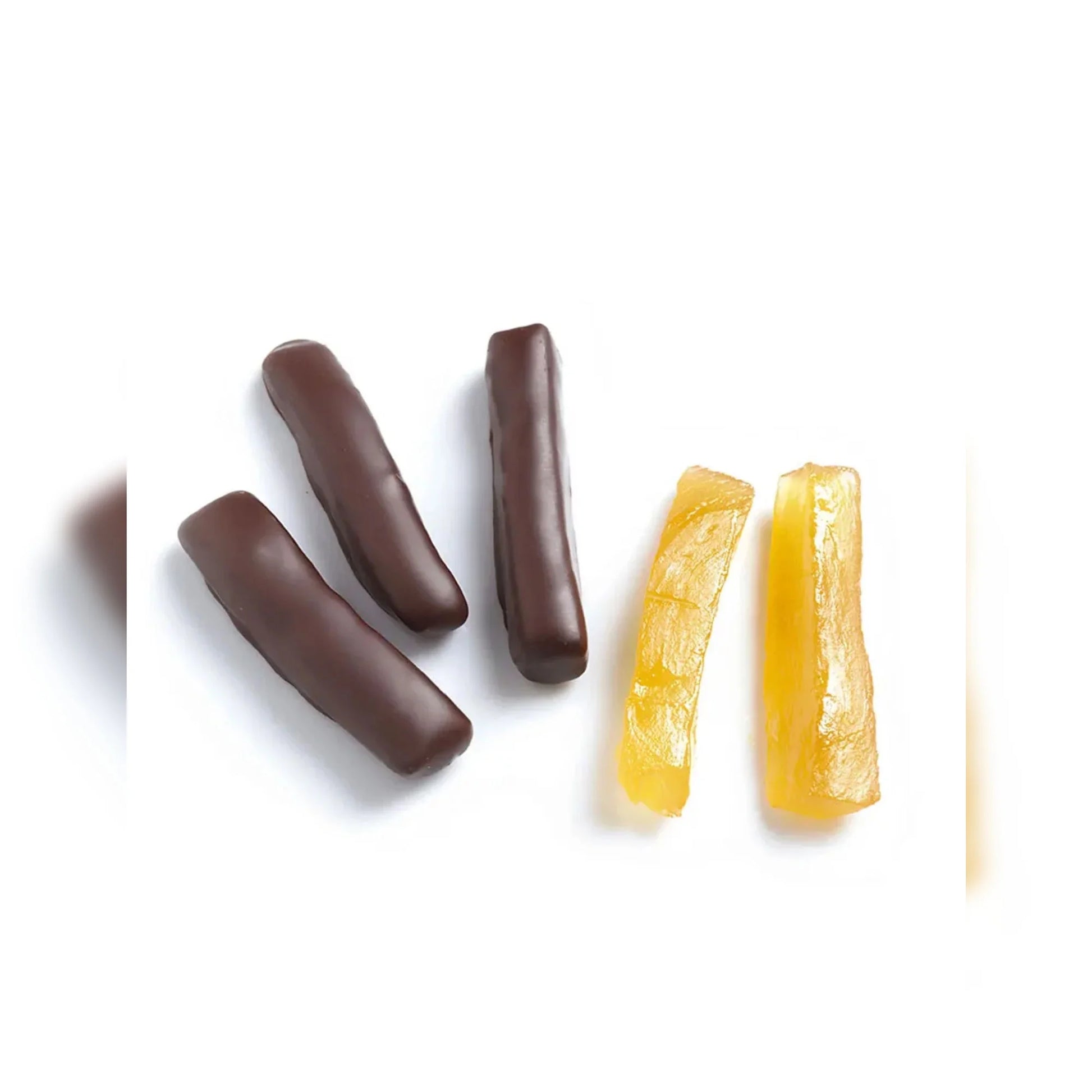 Three chocolate-covered sticks and two yellow fruit sticks on a white background