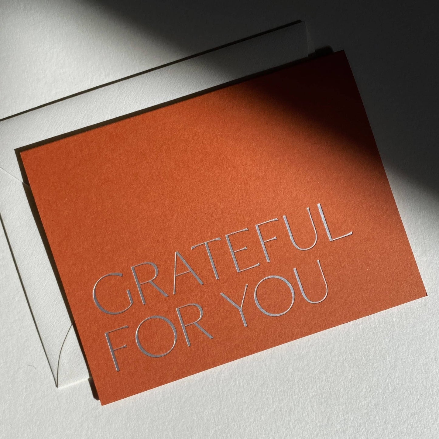 Orange card with 'Grateful for You' text on a white background
