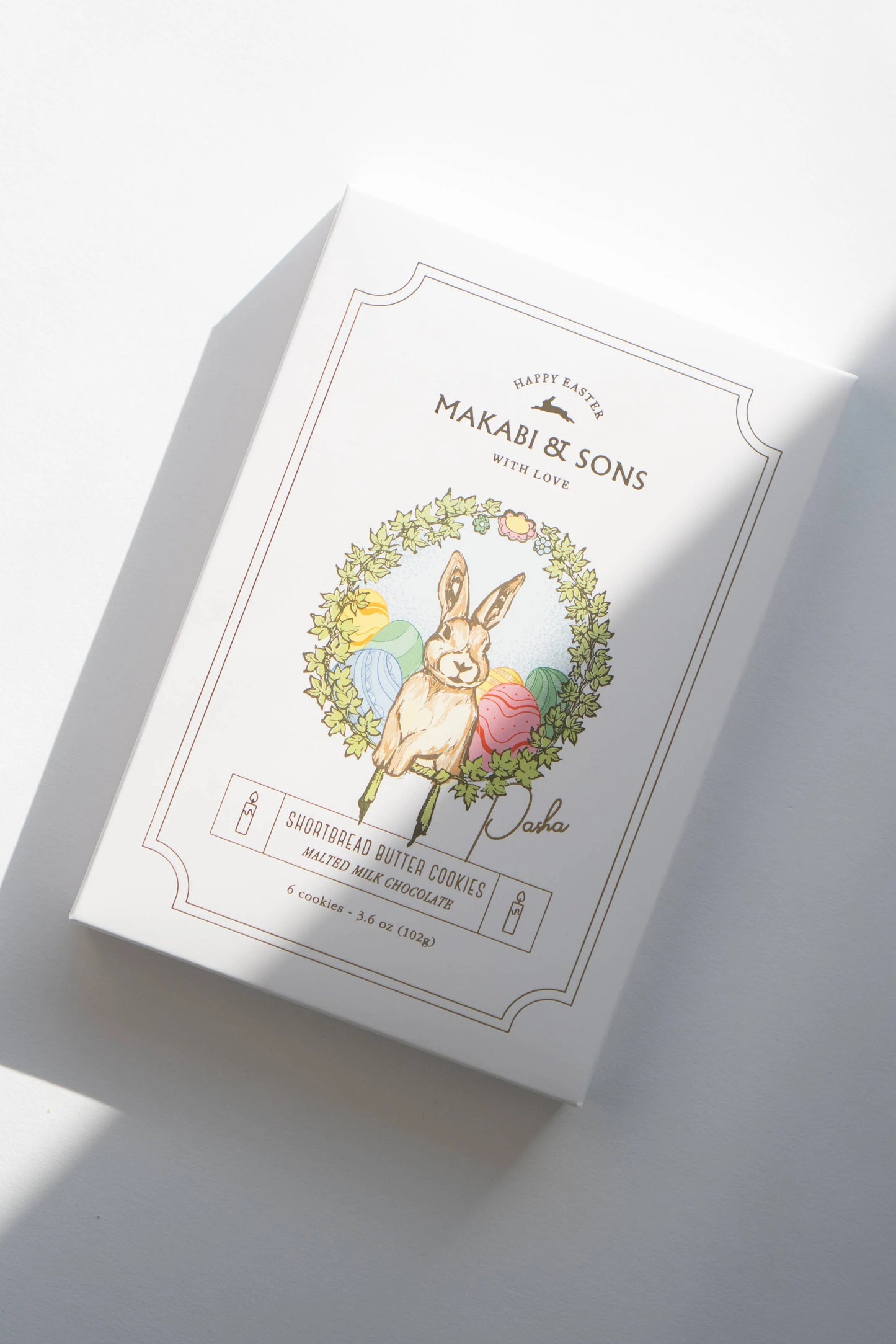 Product packaging with a rabbit illustration and text on a light background