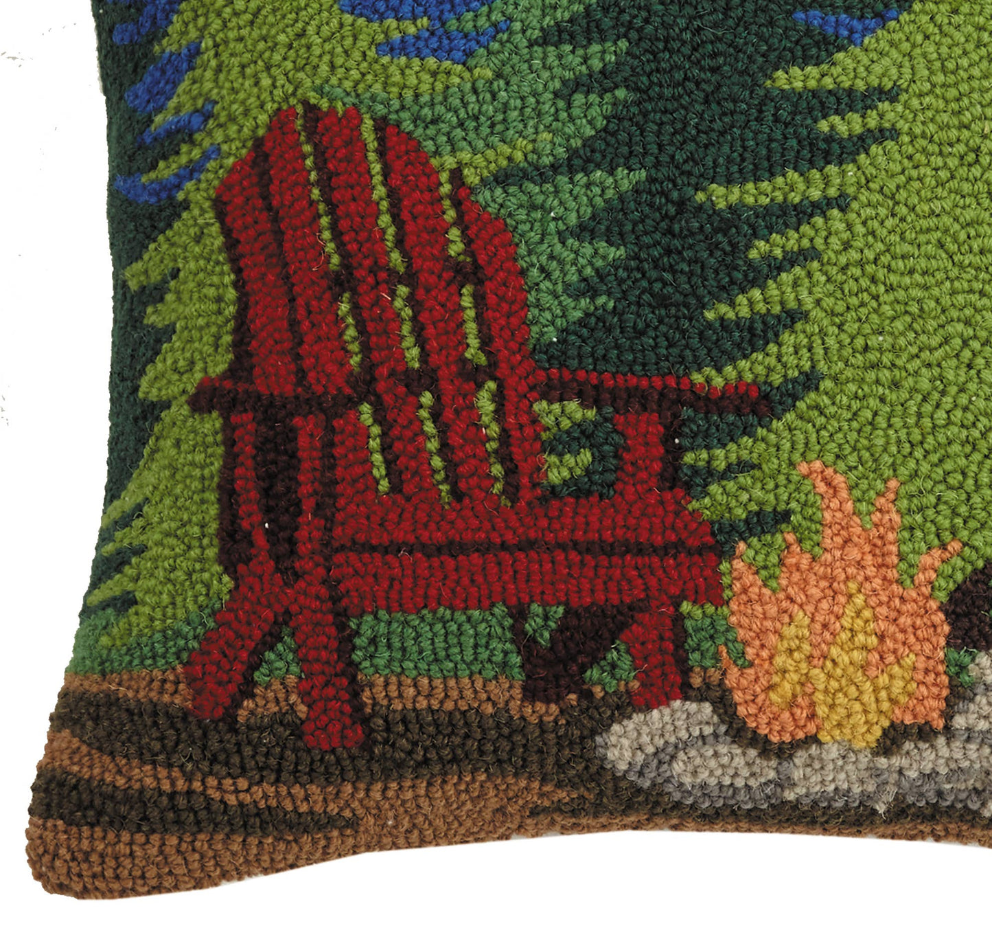 Decorative pillow with a red Adirondack chair and campfire design.