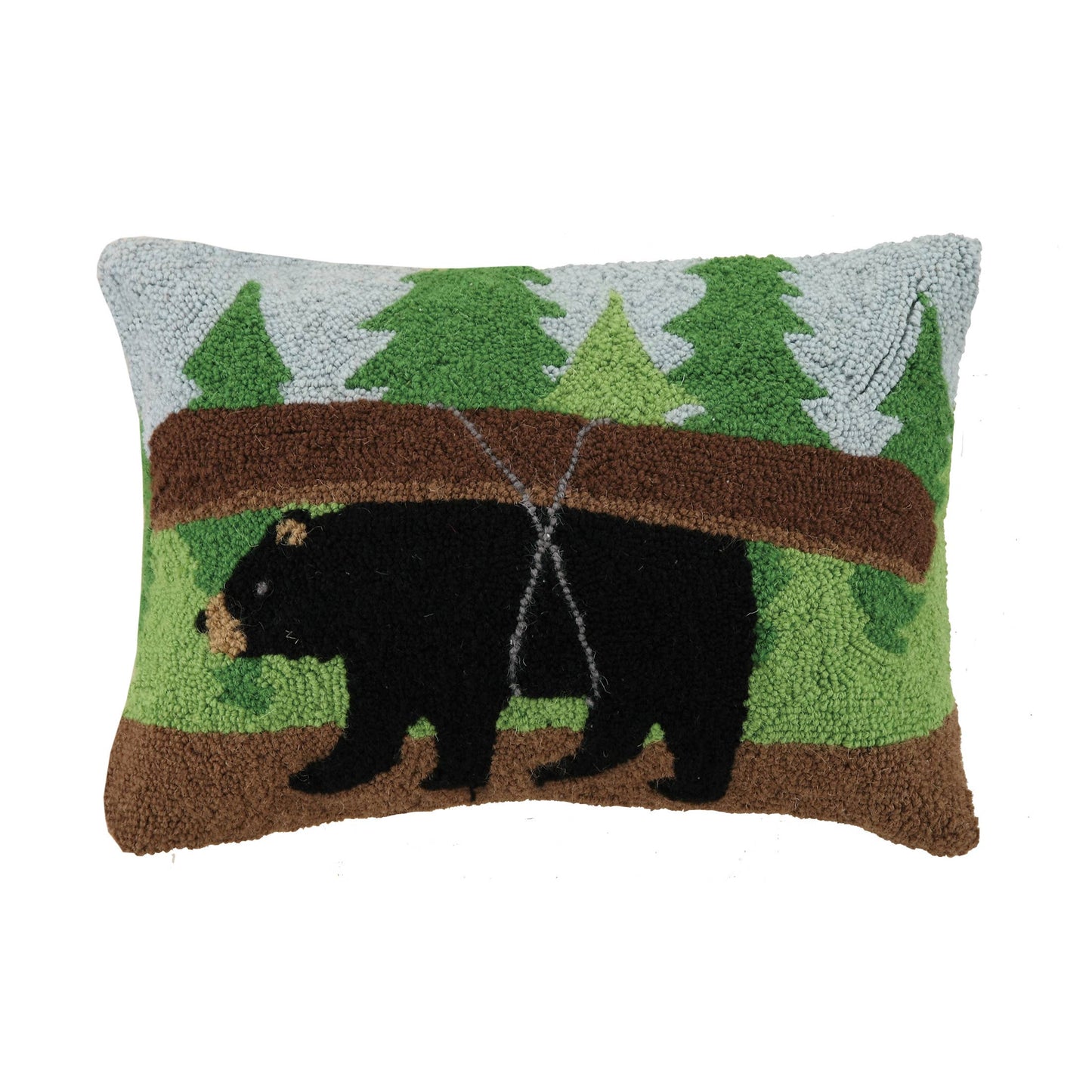 Decorative pillow with bear and forest design on a white background
