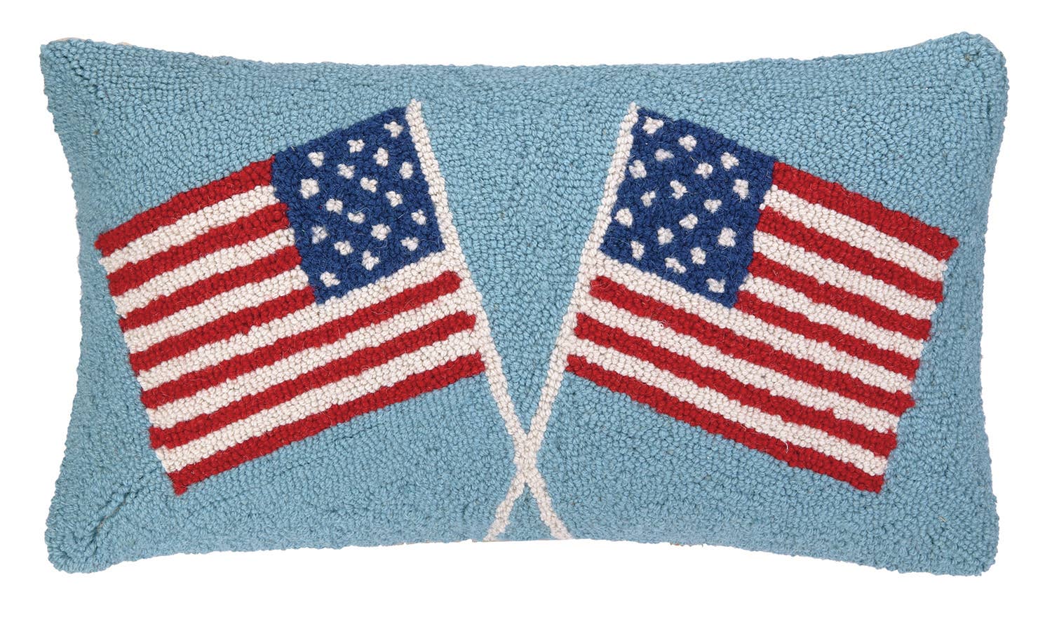 Decorative pillow with two crossed American flags on a blue background