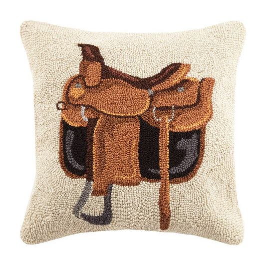 Decorative pillow with a brown saddle design on a beige background