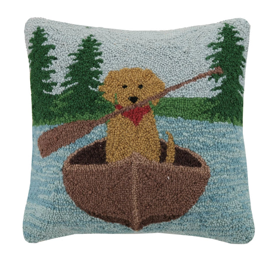 Pillow with a dog in a boat design on a white background