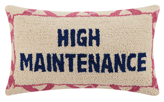 Decorative pillow with 'HIGH MAINTENANCE' text on a white background