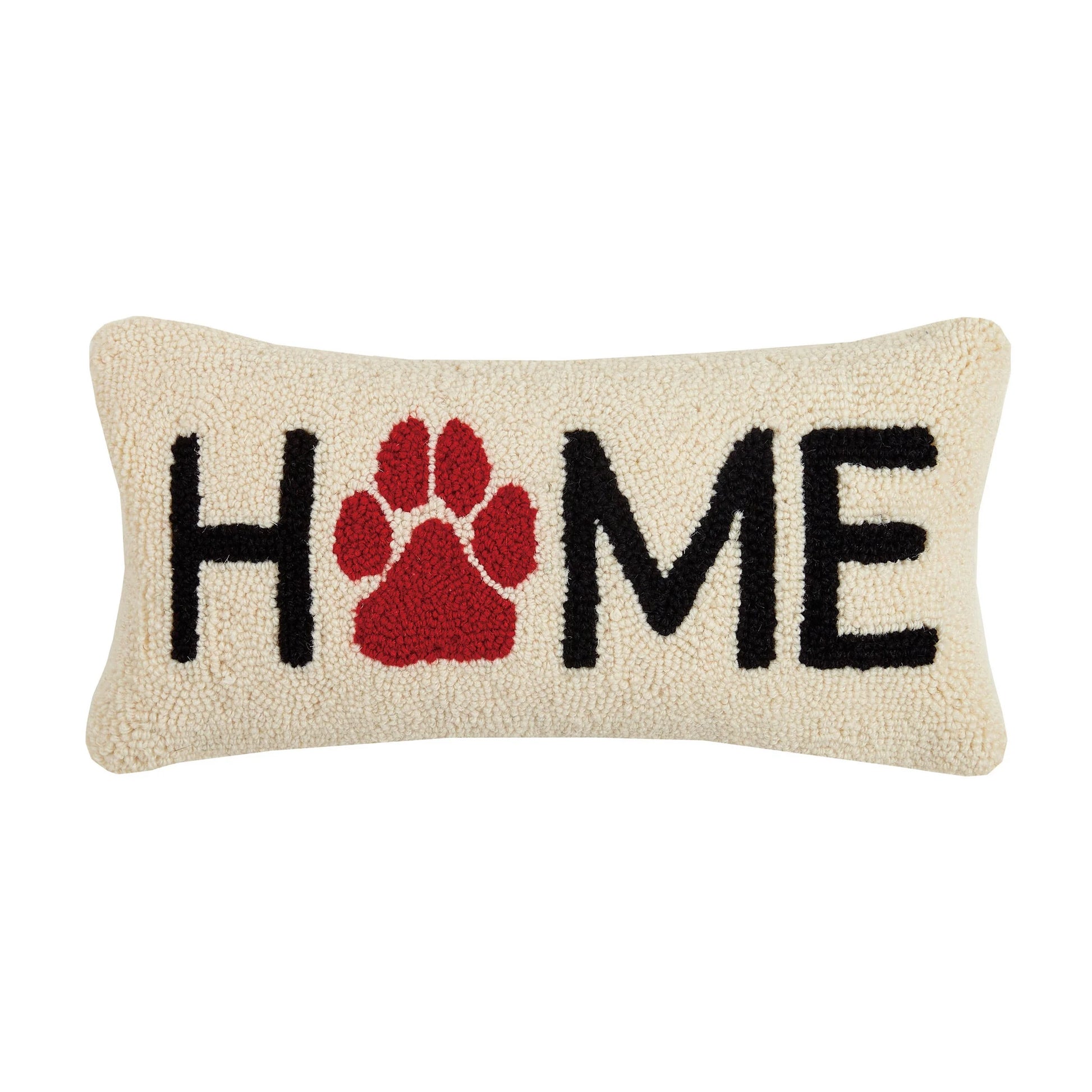 Decorative pillow with 'HOME' and a red paw print on a beige background