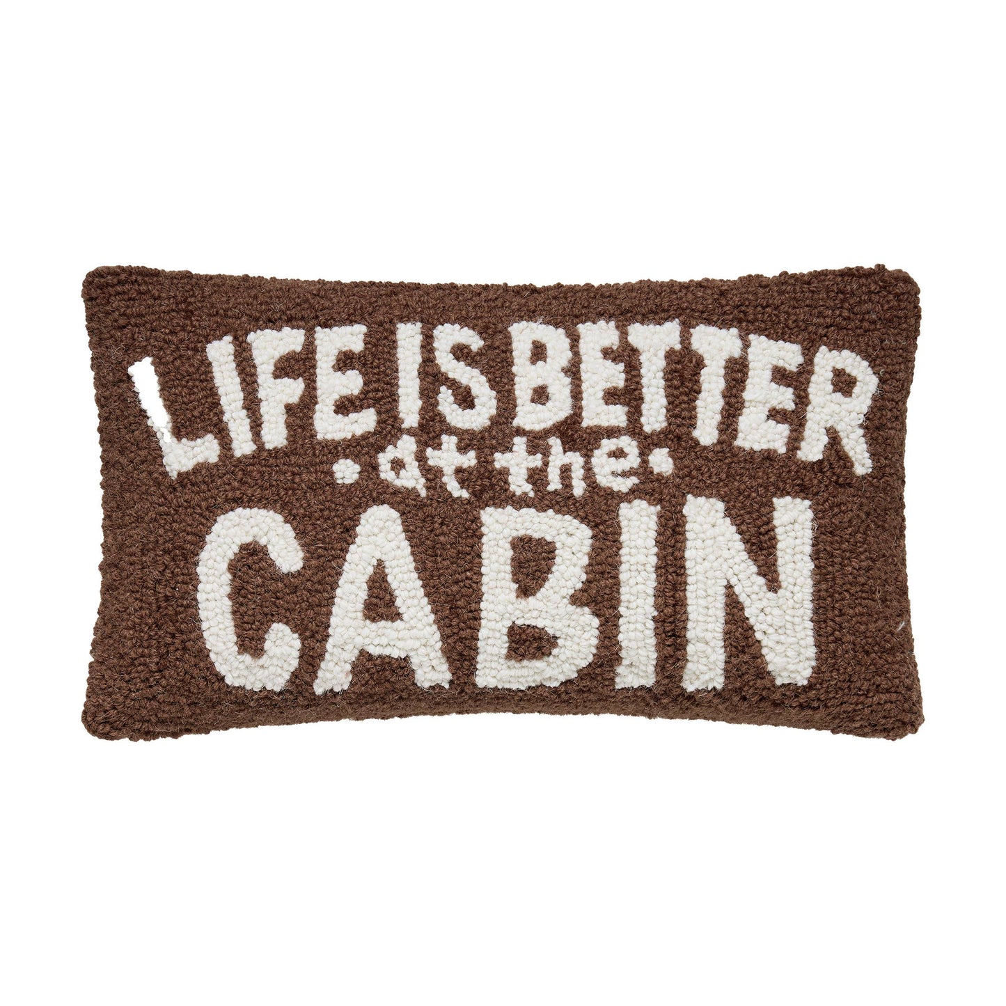 Textile product with 'Life is better at the cabin' text on a brown background