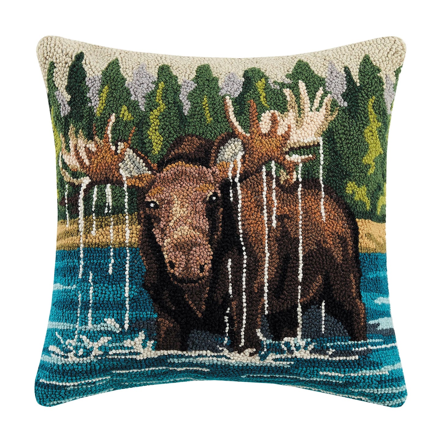 Decorative pillow with moose design in a forest setting