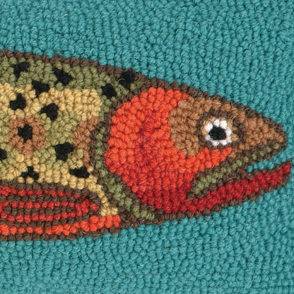 Textured fish design on a teal background